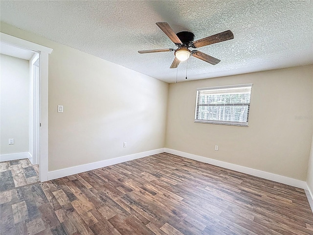 1025 Reading Rd, Lutz, FL 33558 - unfurnished room with wood finished floors, ceiling fan, a textured ceiling, and baseboards