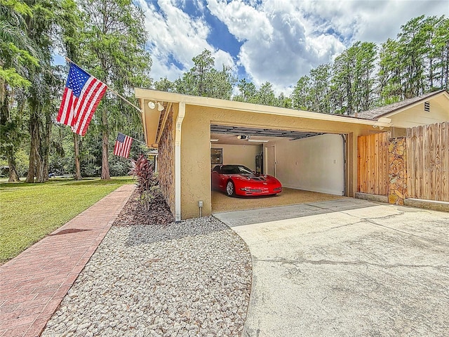 1025 Reading Rd, Lutz, FL 33558 - garage featuring concrete driveway
