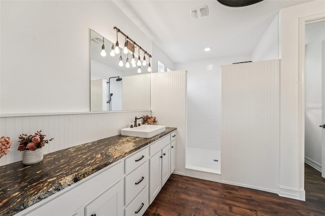 19191 Pease Pl, Lutz, FL 33558 - full bath with walk in shower, wood finished floors, and vanity