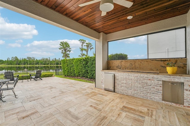 19191 Pease Pl, Lutz, FL 33558 - view of patio / terrace with exterior kitchen and ceiling fan