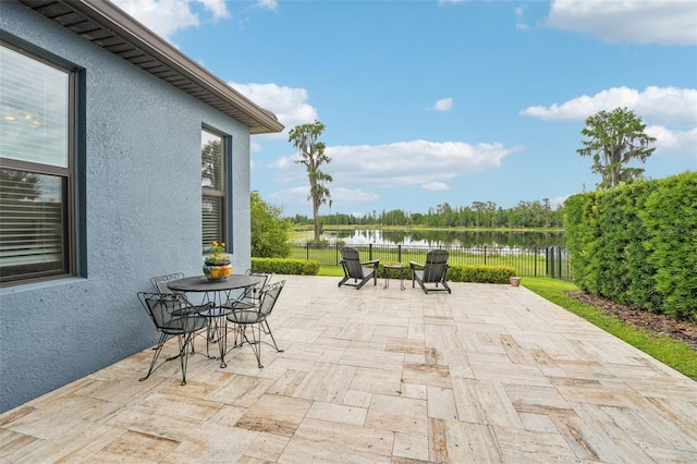 19191 Pease Pl, Lutz, FL 33558 - view of patio / terrace with a water view and outdoor dining space