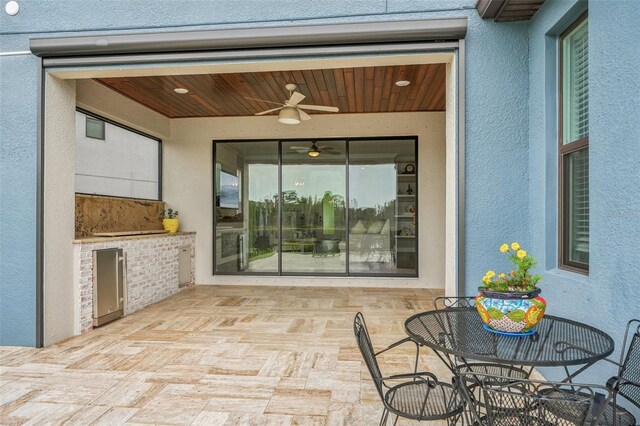 19191 Pease Pl, Lutz, FL 33558 - view of patio featuring a ceiling fan and area for grilling