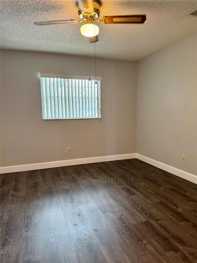 3802 N Oak Dr Unit W22, Tampa, FL 33611 - empty room featuring wood finished floors, ceiling fan, a textured ceiling, and baseboards