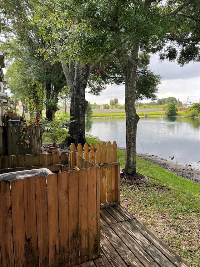 7616 Colonial Ct, Tampa, FL 33615 - wooden terrace featuring a water view