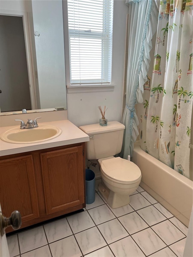 7616 Colonial Ct, Tampa, FL 33615 - bathroom featuring vanity, toilet, and shower / bath combination with curtain
