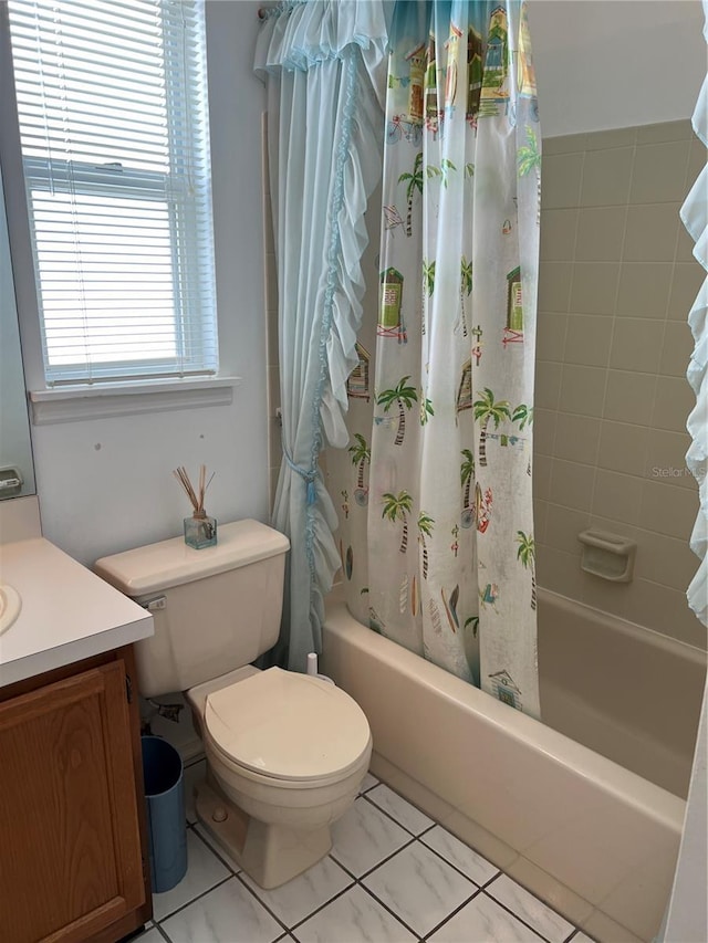 7616 Colonial Ct, Tampa, FL 33615 - bathroom with toilet, vanity, and shower / bath combo with shower curtain