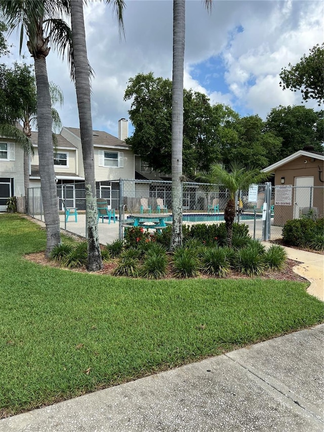 7616 Colonial Ct, Tampa, FL 33615 - view of property's community featuring a swimming pool