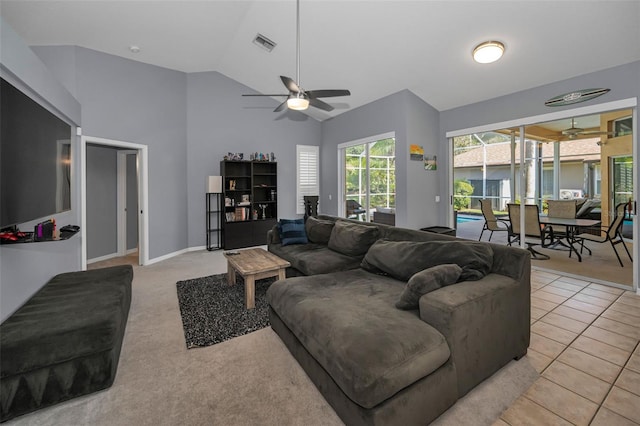 4133 Auston Way, Palm Harbor, FL 34685 - living area featuring a ceiling fan, baseboards, high vaulted ceiling, and light carpet