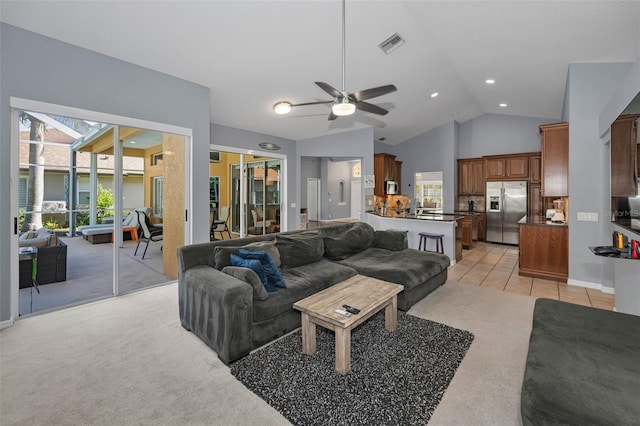 4133 Auston Way, Palm Harbor, FL 34685 - living area with ceiling fan, vaulted ceiling, and light colored carpet