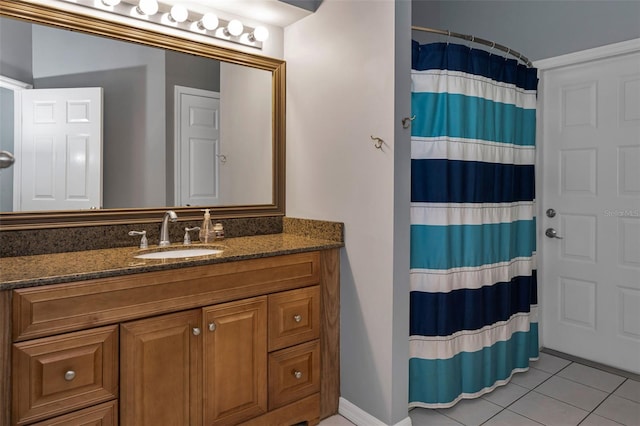 4133 Auston Way, Palm Harbor, FL 34685 - full bath featuring tile patterned flooring, vanity, a shower with shower curtain, and baseboards