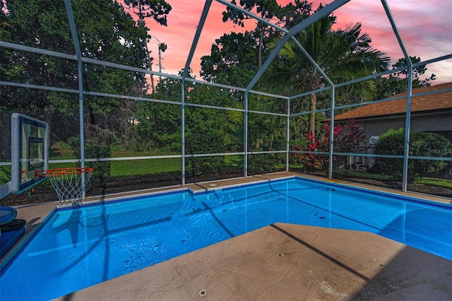 4133 Auston Way, Palm Harbor, FL 34685 - swimming pool featuring glass enclosure and a patio
