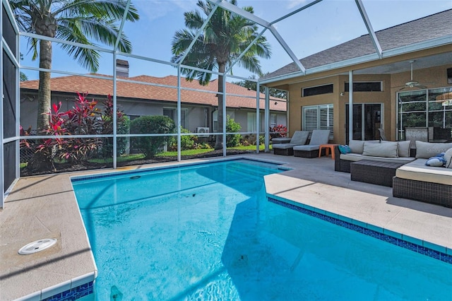 4133 Auston Way, Palm Harbor, FL 34685 - outdoor pool with an outdoor living space, a patio, a lanai, and a ceiling fan
