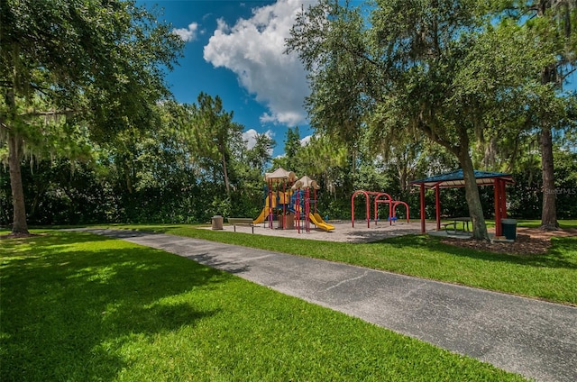 4133 Auston Way, Palm Harbor, FL 34685 - community play area featuring a lawn