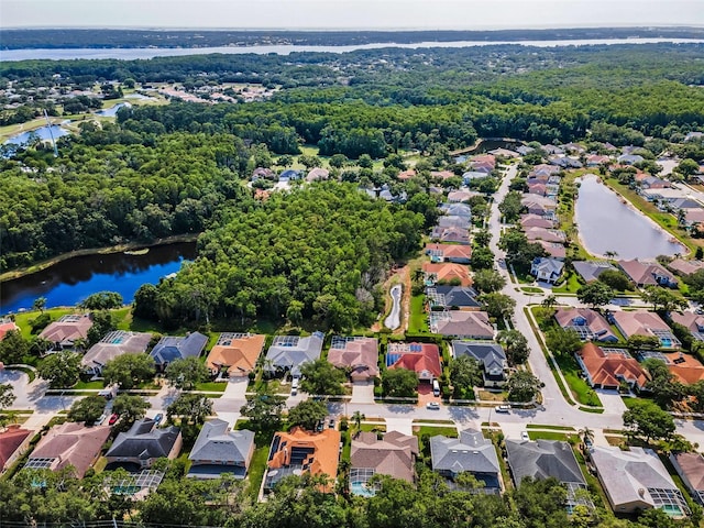 4133 Auston Way, Palm Harbor, FL 34685 - aerial overview of property's location featuring nearby suburban area and a large body of water