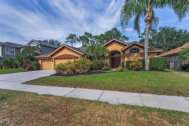 4133 Auston Way, Palm Harbor, FL 34685 - view of front facade featuring stucco siding, an attached garage, a front lawn, cooling unit, and driveway