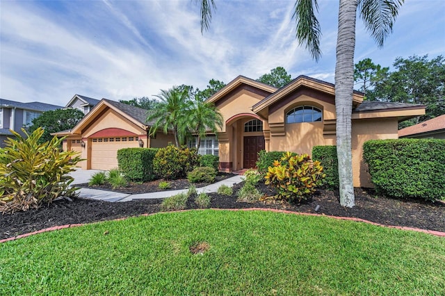 4133 Auston Way, Palm Harbor, FL 34685 - ranch-style home featuring stucco siding, a garage, a front lawn, and concrete driveway