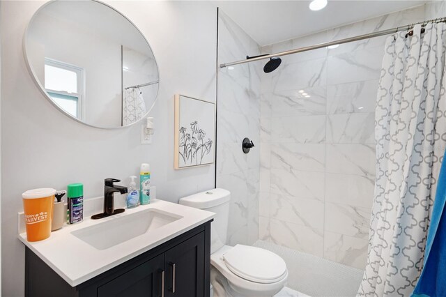 13325 1st St E, Madeira Beach, FL 33708 - full bath featuring toilet, vanity, and tiled shower