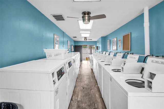 24862 US Highway 19 N Unit 1105, Clearwater, FL 33763 - shared laundry featuring washing machine and dryer, ceiling fan, and wood finished floors