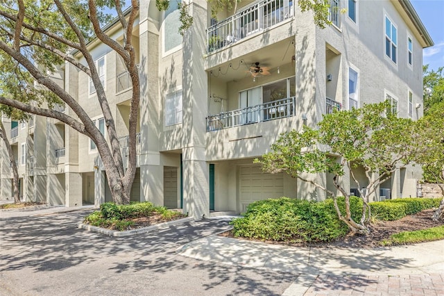 741 Mainsail Dr, Tampa, FL 33602 - view of building exterior featuring an attached garage