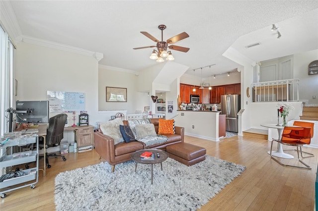 741 Mainsail Dr, Tampa, FL 33602 - living area featuring rail lighting, ceiling fan, an office area, crown molding, and light wood finished floors