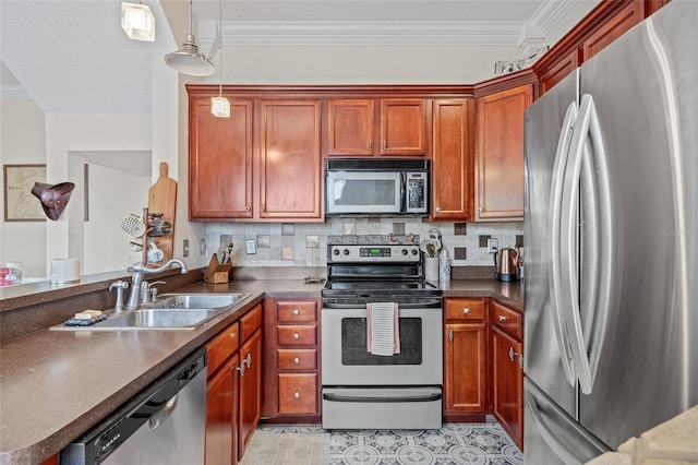 741 Mainsail Dr, Tampa, FL 33602 - kitchen featuring appliances with stainless steel finishes, a sink, dark countertops, ornamental molding, and a peninsula