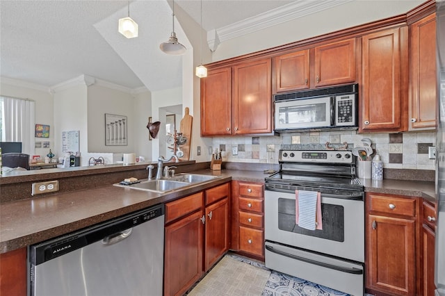 741 Mainsail Dr, Tampa, FL 33602 - kitchen featuring appliances with stainless steel finishes, a sink, dark countertops, ornamental molding, and a peninsula