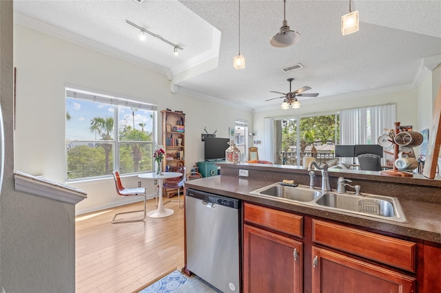 741 Mainsail Dr, Tampa, FL 33602 - kitchen featuring dishwasher, ornamental molding, a sink, a textured ceiling, and dark countertops
