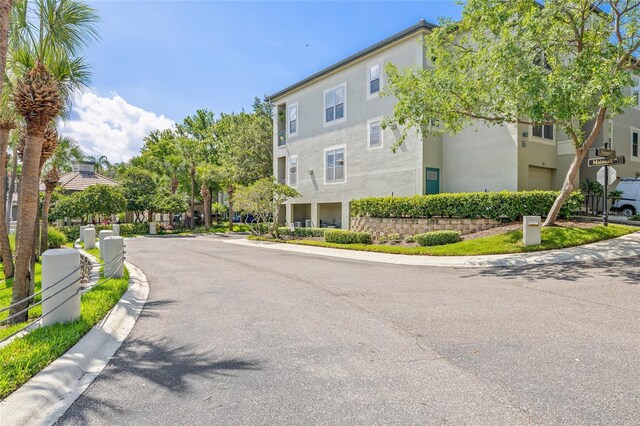 741 Mainsail Dr, Tampa, FL 33602 - view of asphalt street featuring curbs