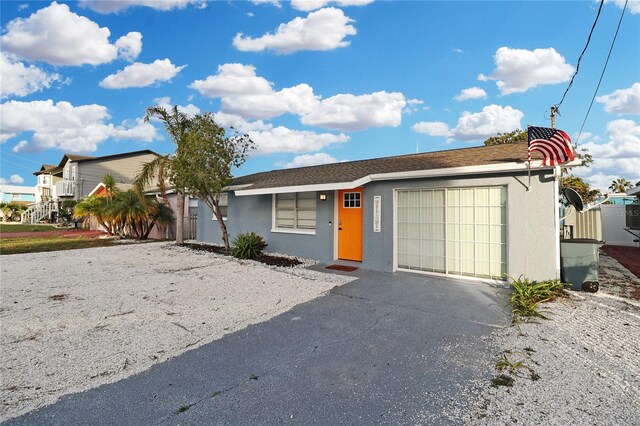 13800 Judy Ave, Hudson, FL 34667 - ranch-style house with stucco siding