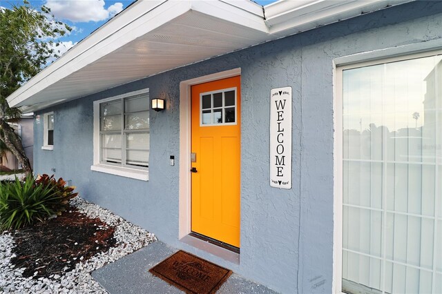 13800 Judy Ave, Hudson, FL 34667 - view of exterior entry with stucco siding