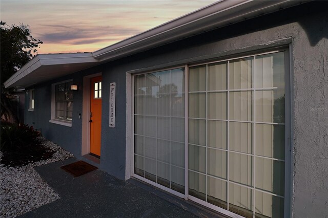 13800 Judy Ave, Hudson, FL 34667 - entrance to property featuring stucco siding