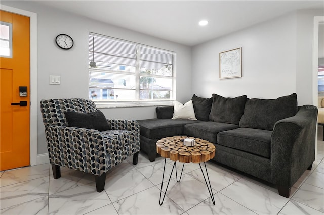 13800 Judy Ave, Hudson, FL 34667 - living area with light marble finish flooring, recessed lighting, and baseboards