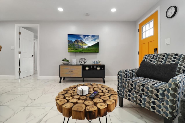 13800 Judy Ave, Hudson, FL 34667 - living area with light marble finish floors, baseboards, and recessed lighting