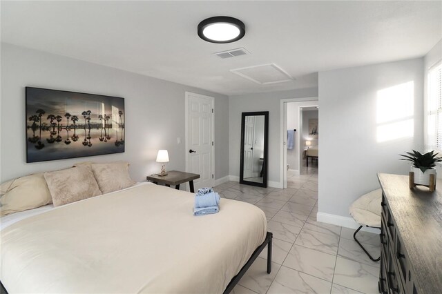 13800 Judy Ave, Hudson, FL 34667 - bedroom featuring attic access, light marble finish flooring, and baseboards