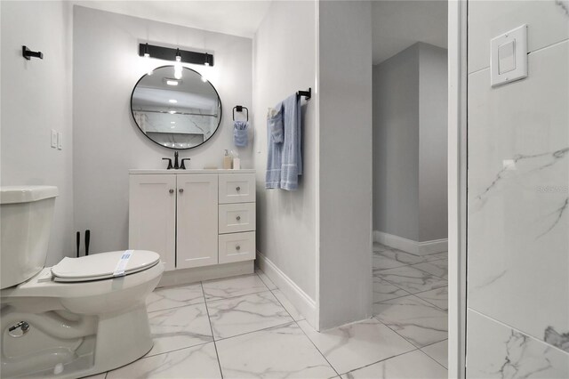 13800 Judy Ave, Hudson, FL 34667 - bathroom with marble finish floors, vanity, baseboards, and toilet