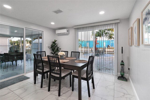 13800 Judy Ave, Hudson, FL 34667 - dining room featuring light marble finish floors, recessed lighting, a wall unit AC, and plenty of natural light
