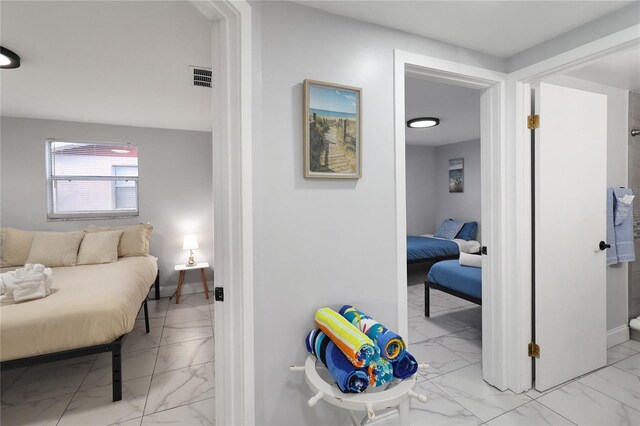 13800 Judy Ave, Hudson, FL 34667 - bedroom with light marble finish flooring and baseboards