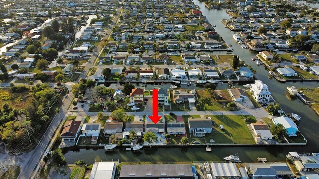 13800 Judy Ave, Hudson, FL 34667 - aerial view of property and surrounding area with nearby suburban area and a large body of water