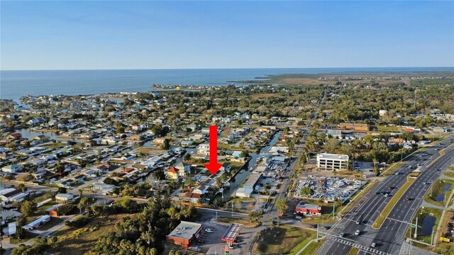 13800 Judy Ave, Hudson, FL 34667 - aerial view of property and surrounding area featuring a main thoroughfare and a nearby body of water