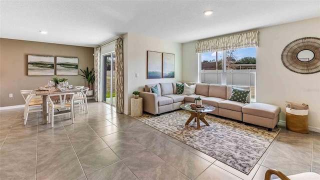1702 Tahitian Sunrise Dr, Plant City, FL 33565 - living room with baseboards, recessed lighting, and tile patterned floors