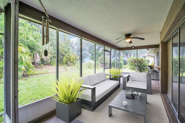 2608 Camille Dr, Palm Harbor, FL 34684 - sunroom featuring ceiling fan and outdoor lounge area