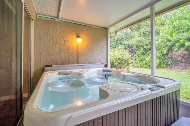 2608 Camille Dr, Palm Harbor, FL 34684 - sunroom / solarium featuring a jacuzzi