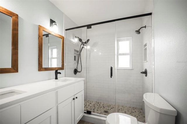 403 Normandy Rd, Madeira Beach, FL 33708 - full bathroom with toilet, a stall shower, and double vanity