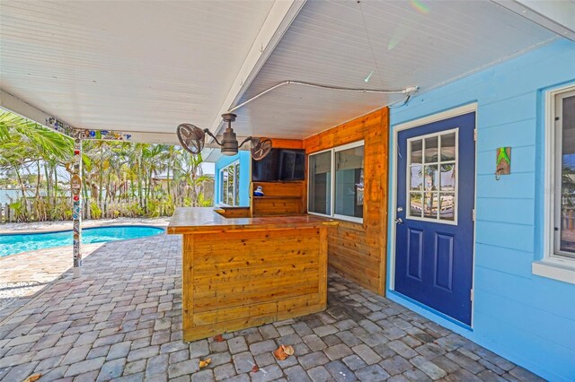 403 Normandy Rd, Madeira Beach, FL 33708 - view of patio featuring an outdoor pool