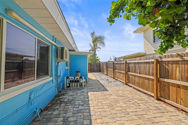 403 Normandy Rd, Madeira Beach, FL 33708 - fenced backyard featuring a patio
