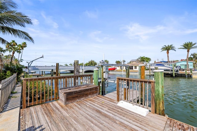 403 Normandy Rd, Madeira Beach, FL 33708 - dock area featuring a water view and boat lift