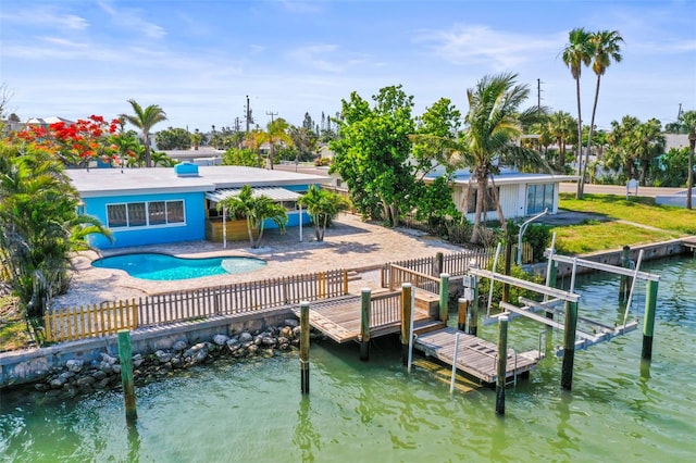 403 Normandy Rd, Madeira Beach, FL 33708 - dock area featuring a patio area and a water view