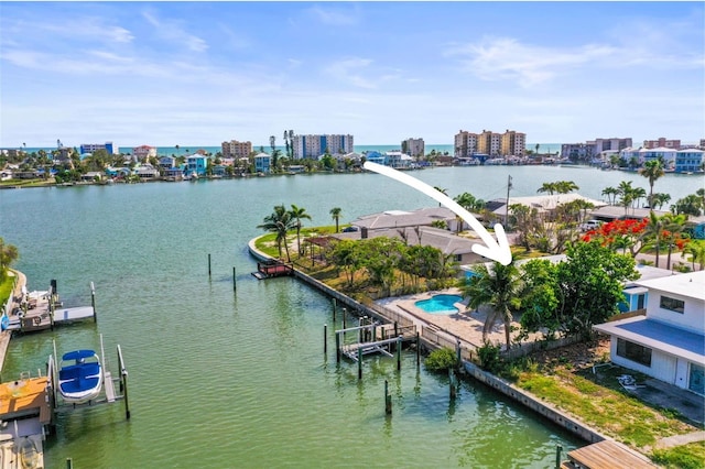 403 Normandy Rd, Madeira Beach, FL 33708 - water view featuring nearby urban area, a boat dock, and boat lift