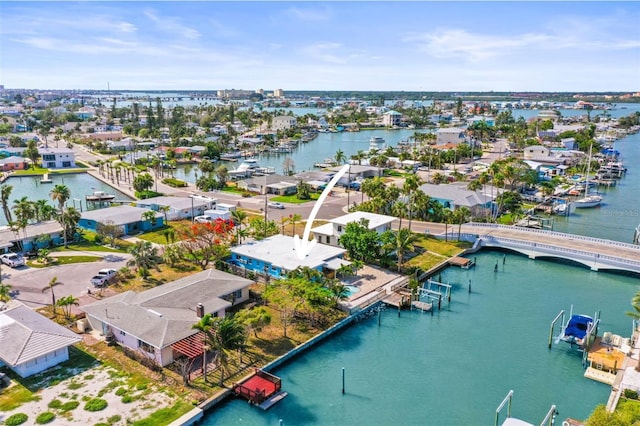 403 Normandy Rd, Madeira Beach, FL 33708 - aerial perspective of suburban area with a nearby body of water and a notable bridge