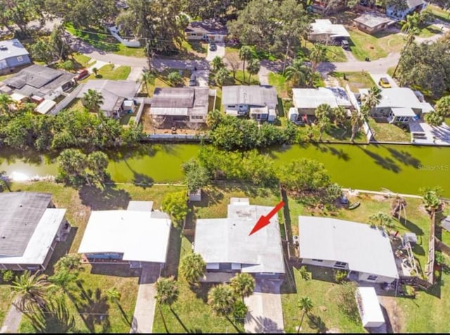 7313 Royal Palm Dr, New Port Richey, FL 34652 - aerial view of property's location with nearby suburban area and a large body of water